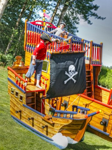 Child Pirate War Between Miniature Play Pirate Ship And Pirate Galleon
