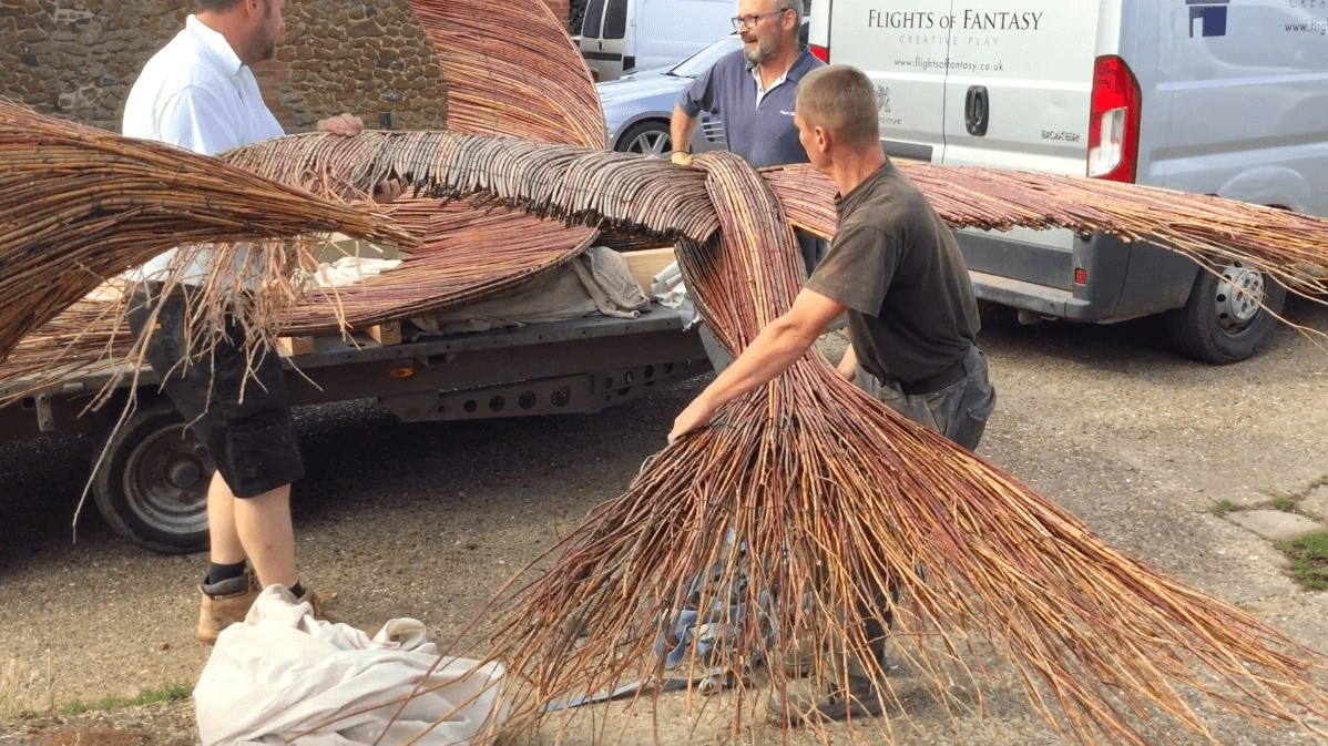Loading Giant Swift Bird Sculpture