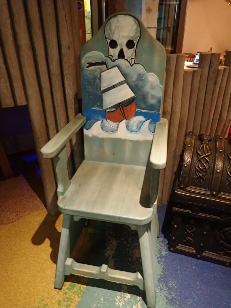 Ship And Skull Pirate Themed Seating Chairs For Smugglers Bar And Grill By Flights Of Fantasy E1482244310352