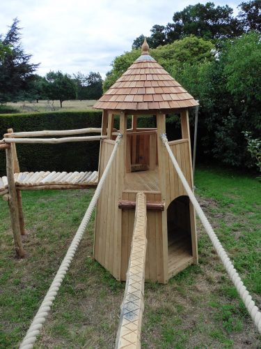 beam and rope bridge in rustic garden adventure trail