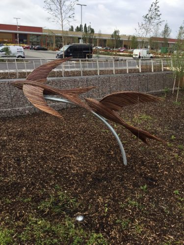 racing swallow sculptures